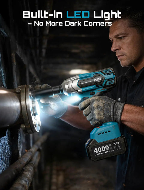 Person using Cordless Impact Wrench 1/2 Inch High Torque Beast With Brushless Motor 479 Ft Lbs (650 Nm) in dimly lit area with LED light.