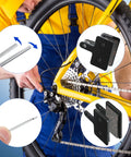 Man installing Eight Pairs Copper Semi Metallic Bike Brake Pads For TRP Tektro Shimano Deore on yellow bicycle