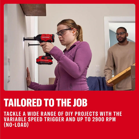 Person using Cordless Quarter Inch Impact Driver Kit With 2Ah Lithium Battery, Charger And PH2 Bit, LED Light, High Torque, Variable Speed Up To 2900 RPM For Fasteners From Deck Screws To Lag Bolts And Quick One Hand Bit Changes on wall