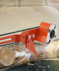 Knockout Chainsaw Mill Attachment And Log Debarker Peeler Featuring Four Heavy Duty Blades for wood milling on a log.