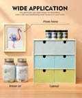 Chalk Furniture Paint Set With Nine Colors In Ultra Matte Finish, 60 Ml Bottles on cabinet next to mason jars and photo frame.