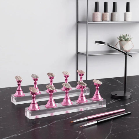 Pink Nail Art Display Stands Set With 54 Adhesive Putty Pieces, Acrylic Nail Stands With Magnetic Tips And Chess Shaped Tips on table