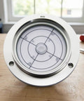 Baoblaze Circular Bubble Level Gauge 80mm Spirit Level with Aluminum Alloy Housing and Acrylic Face for Horizontal Industrial Machinery and Equipment, Style E close-up showing bubble alignment.