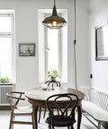 Farmhouse Plug In Pendant Light With 16 Feet Hanging Cord And Wire Cage Shade In Dark Charcoal Gray Finish over dining table