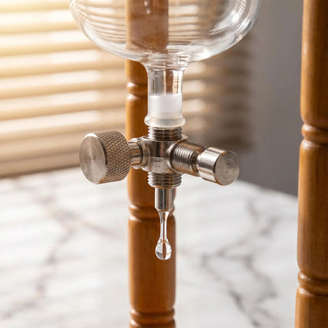 720 Milliliter Cold Brew Coffee Tower With Adjustable Valve drip control close-up, showcasing stainless steel valve for brewing.