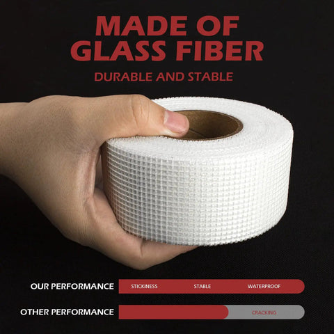 Hand holding Fiberglass Mesh Drywall Tape Self Adhesive Patch Roll 1.97 Inch By 150 Feet For Wall Ceiling Crack Repair