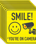 Smile Youre On Camera Signs 7 By 7 Inch 8 Pack Security Notice Stickers For Home Office And Outdoors Deterrent Alerts Visitors Theyre On Camera And Helps Keep Your Family And Property Safe With This Easy To Install Sign Set. 8-pack yellow vinyl decals