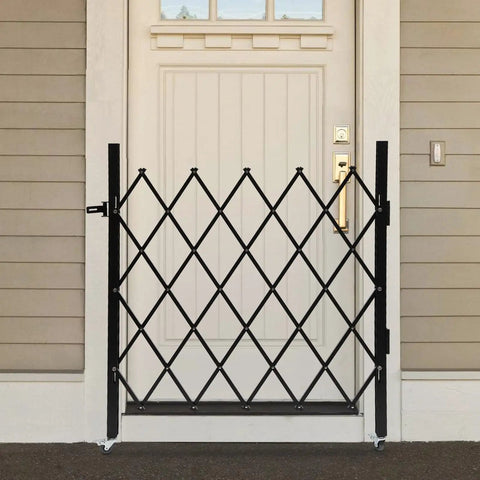 Badass Expandable Folding Security Gate 51 By 36 Inch Black Rugged Steel Diamond Grid Door closed at entrance.