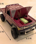 RC Beast Rock Crawler Truck 4x4 Toyota LC79 One Twelfth Scale Off Road Pickup with open hood showcasing engine detail