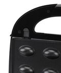 Close-up of the black cooking plate on the Get That Crispy Crunch Every Time With This Badass 10 Plate Electric Panini Press.