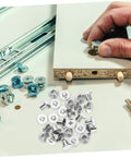 Carbon Steel Binding Screws And Scrapbook Post Fasteners For Photo Albums And Documents Silver Finish in use with tools on project board.