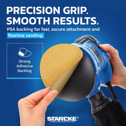 Close-up of 6 Inch 40 Grit PSA Sanding Discs 50 Pack No Hole Round Gold Sandpaper applied on a blue power tool.