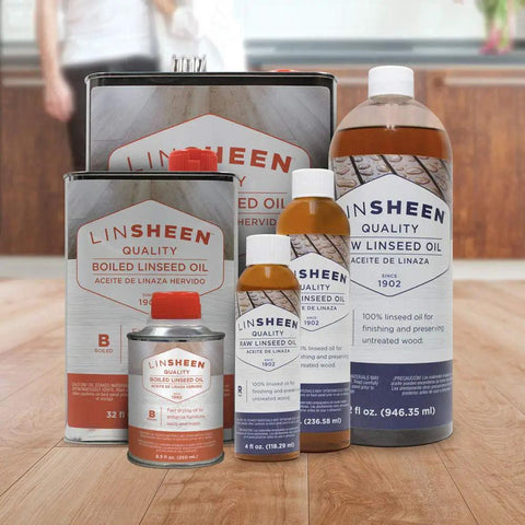 Fast Drying Boiled Linseed Oil For Wood Care, multiple bottle sizes shown on wooden surface