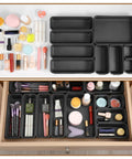 9 Piece Stackable Drawer Organizer Trays Set with modular design filled with makeup items in a drawer.