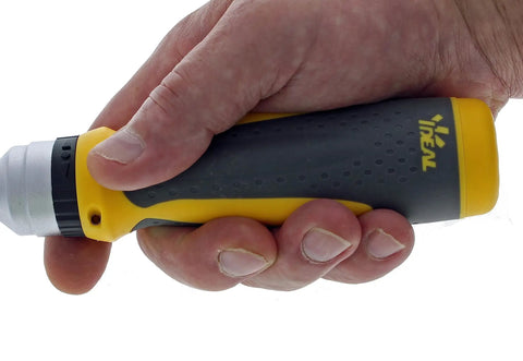 Hand holding Twist-A-Nut 21-In-1 Ratcheting Multi-Bit Screwdriver with pro-grade grip visible.