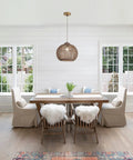 Awesome Hand Woven Rattan Pendant Light With 13.7 Inch Round Basket Shade in kitchen dining area, natural light setting.