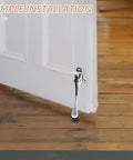 Heavy Duty Zinc Alloy Wall Door Stop With Silver Minimalist Design Kickdown Door Stopper Space Saving Wall Saver For Home Easy No Tools Install Protects Walls From Slams Durable Indoor Outdoor Use installed on white door