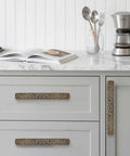 Kitchen view with Six Pack 3 Inch Antique Brass Zinc Alloy Cabinet Drawer Pulls for sideboard, jewelry box, and bathroom furniture.
