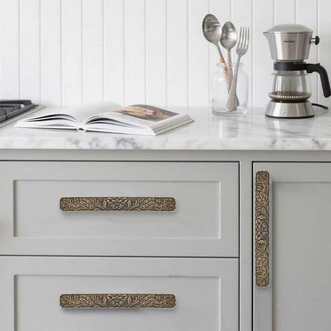 Kitchen view with Six Pack 3 Inch Antique Brass Zinc Alloy Cabinet Drawer Pulls for sideboard, jewelry box, and bathroom furniture.