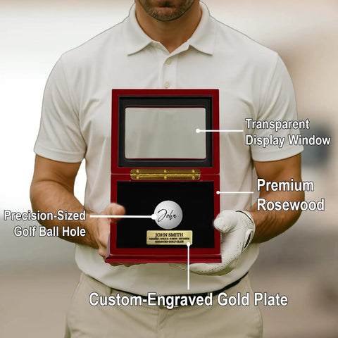 Man holding Golf Ball Display Case For Hole In One Memorabilia, Premium Walnut Wood Box With Engraved Metal Plate, UV Protected Cover.