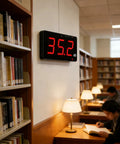 Sound Level Meter With Large LCD Display 9.6 Inch Screen 30 To 130 DB Range Wall Hanging Design in a library setting