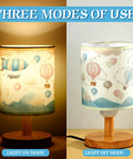 Hot Air Balloon Kids Table Lamp With Linen Shade And Wood Base for Bedroom Nightstand, showing light on and off modes