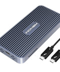 Kick Butt M2 Nvme Ssd Enclosure With 80Gbps Transfer Speed And Quiet Cooling Fan For Thunderbolt And Usb4 Systems, grey aluminum design with USB cables.