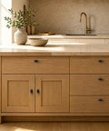10 Pack Oval Zinc Alloy Cabinet Knobs With Straight Up Matte Black Finish on modern wooden kitchen cabinets.