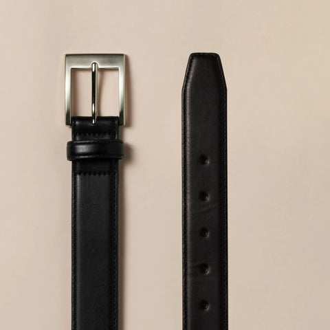 Real Deal Mens Leather Belt With Tough Metal Buckle Daily Casual And Office Strap In Classic Black Size 34 showing buckle and holes.