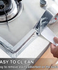 Bomei Pack Heavy Duty Aluminum Foil Tape For HVAC And Metal Repair Plus Air Ducts Sealing being applied around a gas stove, 3 inch wide.