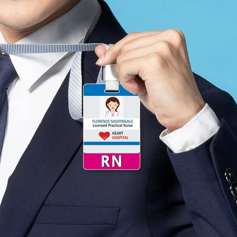 Person holding an ID badge with nurse name and hospital, wearing a suit, focus on badge design and holder.