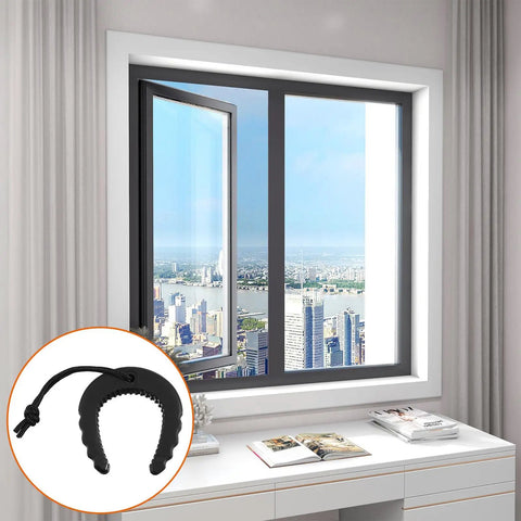 2 Pack Rock Solid Rubber Door Stop Wedges, Non Slip Security Jam Blockers With Heavy Duty Paracord Handles For First Responders, Rapid Emergency Egress And Straight Up Home Privacy, Black next to a window ensuring security and privacy.