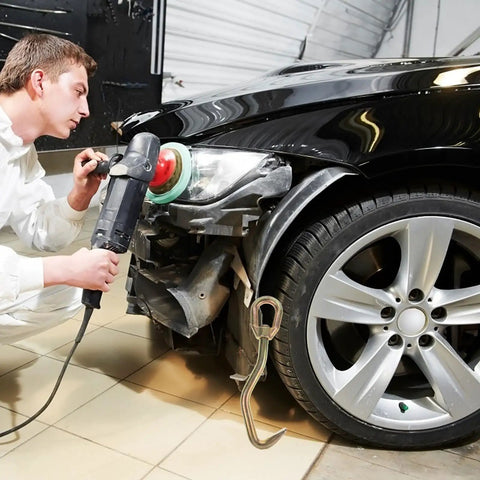 Person using Auto Body Dent Puller Kit With Steel Snake Shape Round Head Hook for sheet metal repair on car body.