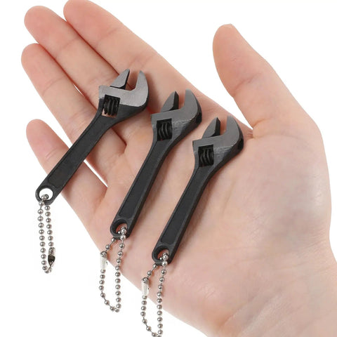 Pocket Size 3 Piece Tiny Adjustable Wrench Set 2.5 Inch Mini Crescent Wrenches with Chain Locking Feature in hand