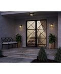 Two Light Outdoor Flush Mount Light In Antique Bronze With Clear Glass Diffuser on covered patio entrance