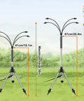 Outdoor Patio Water Mister System 26.5 Feet Portable Cooling Mister With Adjustable Height Stand Flexible Tubing And Wind Resistant Stainless Base For BBQs Pets Backyards Garden Parties shown in adjustable height settings amidst a green lawn.