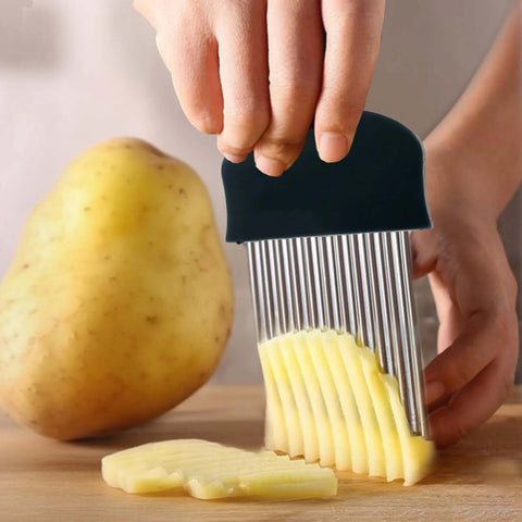Zorveiio black stainless steel crinkle cutter slicing potato on cutting board
