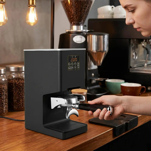 Electronic Automatic Espresso Tamper With 58mm Coffee Distribution Disc Adjustable Pressure Settings on kitchen counter