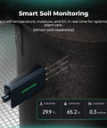 Soil monitoring sensor for Auto Drip Irrigation Kit With 13 Gallon Foldable Bucket, displaying temperature and moisture data.