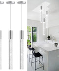 Three Pack Pendant Lights For Kitchen Island Modern Dimmable LED Hanging Lights Silver Finish in a modern kitchen setting