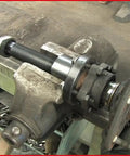 Close-up of Ford Transit Wheel Bearing Tool Kit, 17-Piece Pro Grade Set in use on a vehicle hub.
