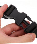 Close-up of hand holding black quick-release buckle on 2 Pack Heavy Duty Tie Down Straps With Quick Release Buckles For Easy Lashing.
