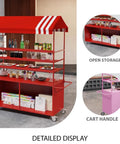 Kickass Rolling Cart With Red Striped Canopy And Wide Iron Top Heavy Duty Portable Vendor Stand On Smooth Casters With Lower Shelf For Street Food Sellers At Outdoor Festivals displaying drinks and snacks in open storage.