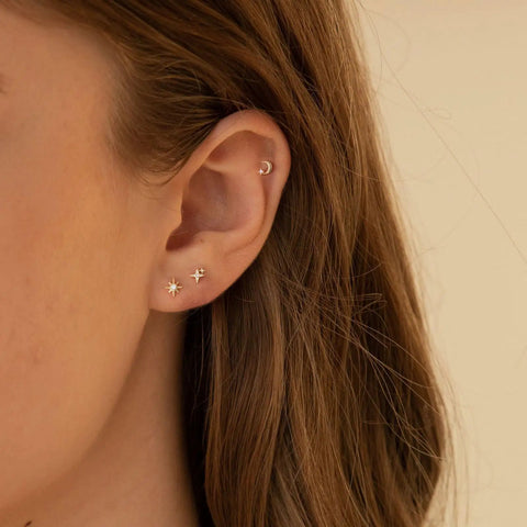 Hypoallergenic Flat Back Earrings For Women 14K Gold Plated Mini Stud Set Of 3 Pairs Featuring Star Moon Sun Shapes Flat Back Cartilage Helix Piercing Jewelry Includes 4mm And 5mm Sizes For Daily Mix And Match. moon stud in upper ear with star and sun flat back studs
