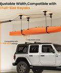 Heavy Duty Kayak Storage Hoist For Garage Ceiling With 180 Lb Capacity, hoisting a kayak above a jeep in a garage setting.