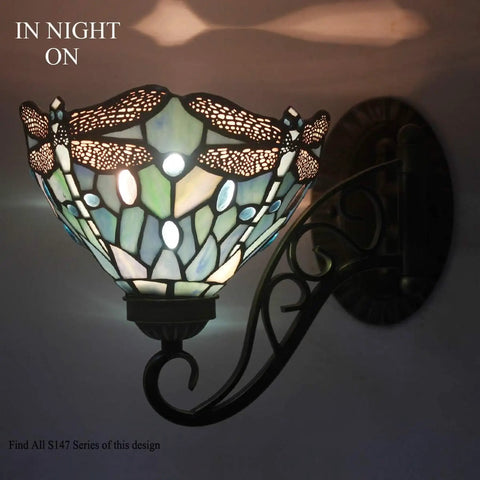 Tiffany Style Wall Sconce Plug In Swing Arm Light With Sea Blue Stained Glass Dragonfly Motif, lit in dark room, S147 Series