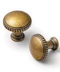 Classic Round Antique Brass Cabinet Knobs Set Of 6 With 1 1/4 Inch Head Diameter, showing two detailed knobs for kitchen drawers and cabinets.