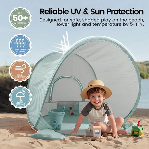Child playing in a Pop Up Baby Beach Tent with UV Protection, lightweight shelter with built-in sand pockets for stable anchoring.