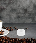 Compact Sturdy Coffee Pressing Adapter For Coffee Holder, Lightweight White PP Material, Pro Grade Precision Craftsmanship For Even Espresso Compression, No Fuss Portable Espresso Machine Accessory, Replacement Ring And Powder Holder Base, white coffee cup scene