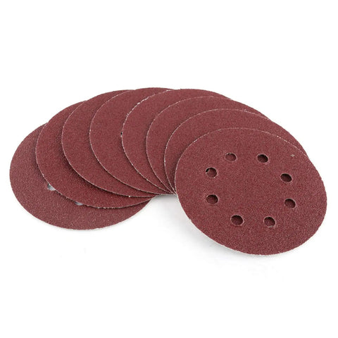 Grab Your Set Of 100 Pieces Of Heavy Duty Aluminum Oxide Sanding Discs With Hook And Loop Pads Perfect For Smoothing Furniture And Car Bodies Fast, showing multiple sanding discs with holes.